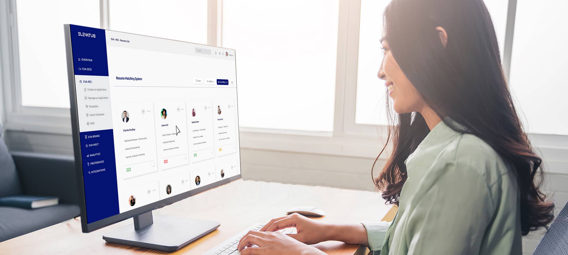 5 Great Ways AI is Transforming Remote Recruitment in 2021 | Elevatus recruiter smiling while reviewing candidates