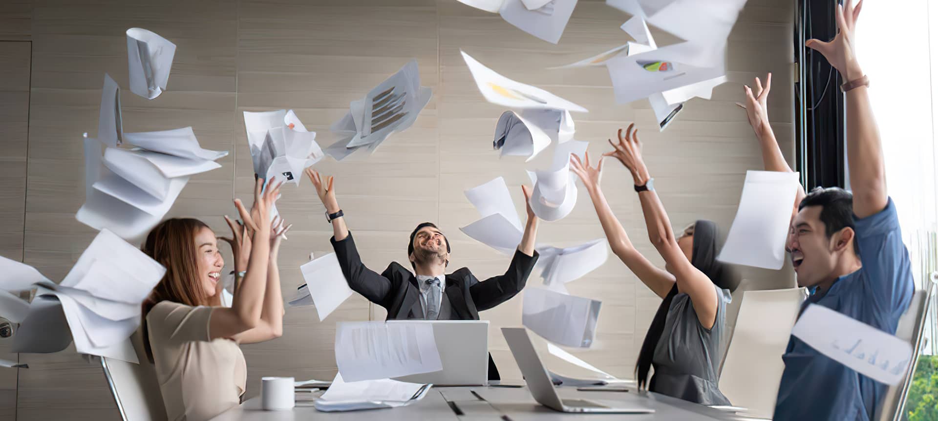 A talent acquisition team celebrating hiring success