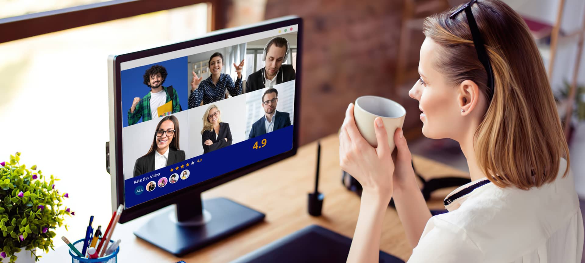 A recruiter watching video assessment interviews