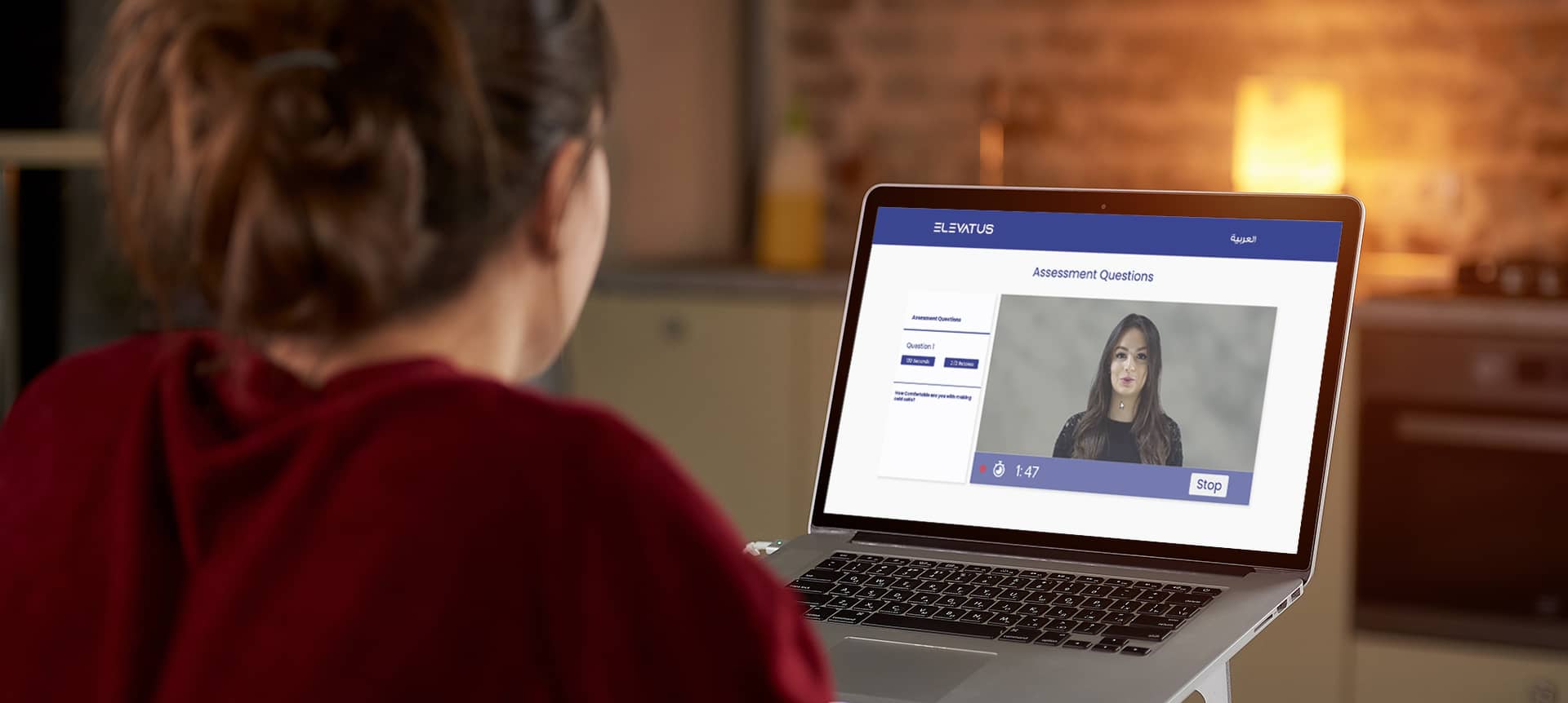 laptop showing a video assessment interview