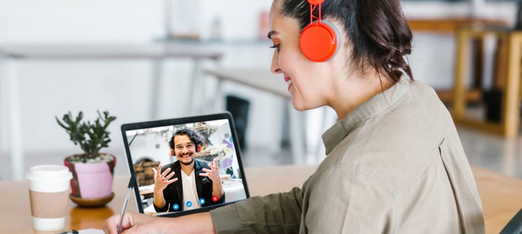 A recruiter and a candidate communicating through a video interviewing software