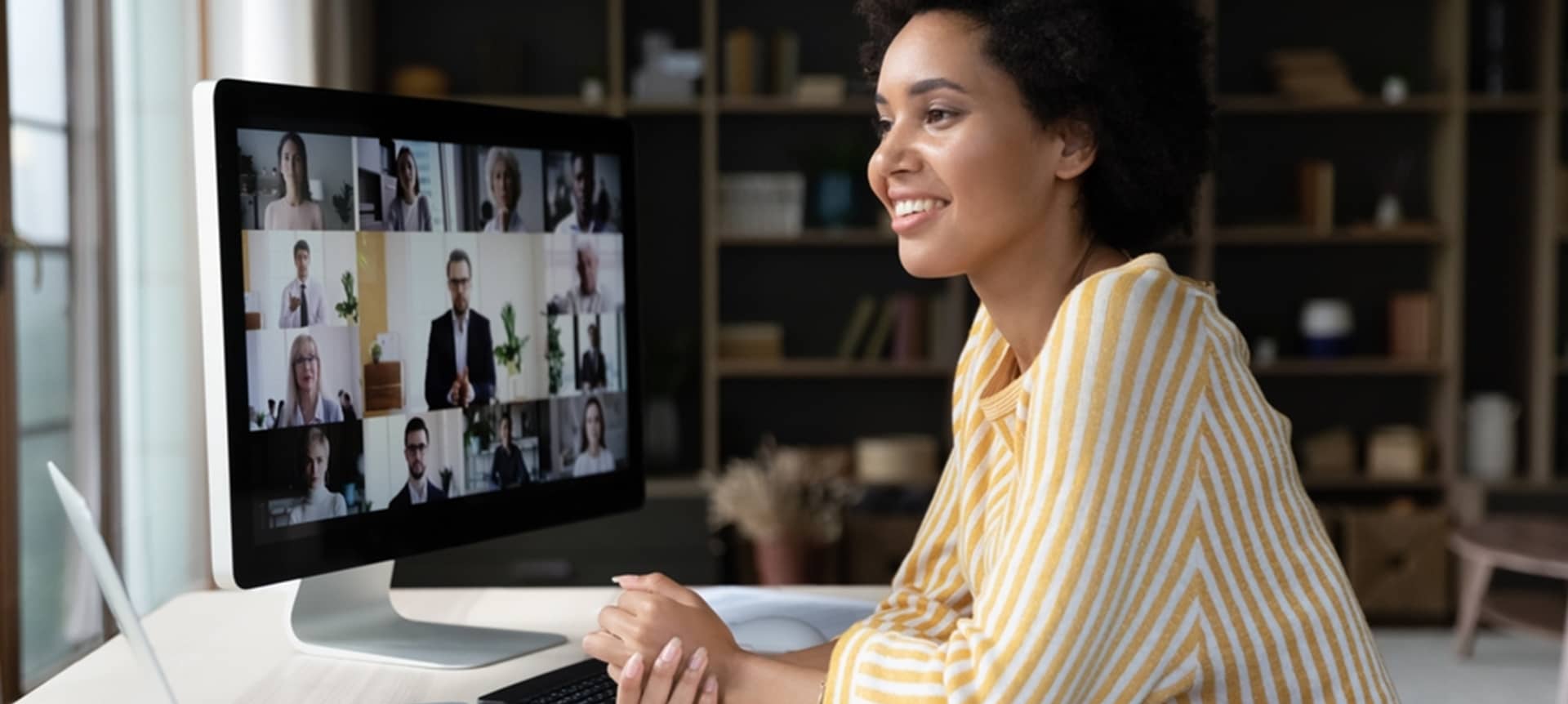 A female candidate being interviewed via video interviewing software