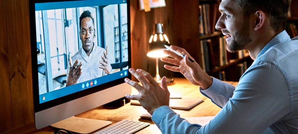 A candidate explains to a recruiter, using video interview software, when he successfully generates new business.