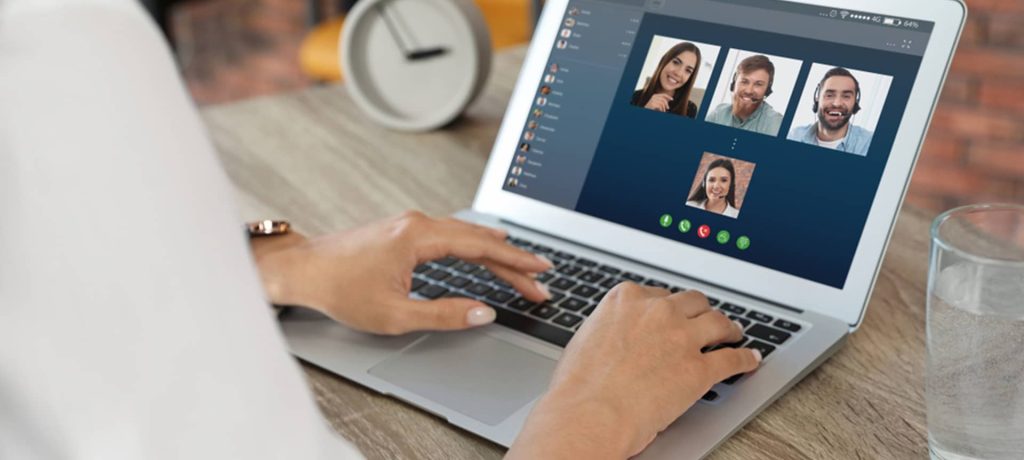 a recruiter connecting with candidates from around the world through video interviewing software