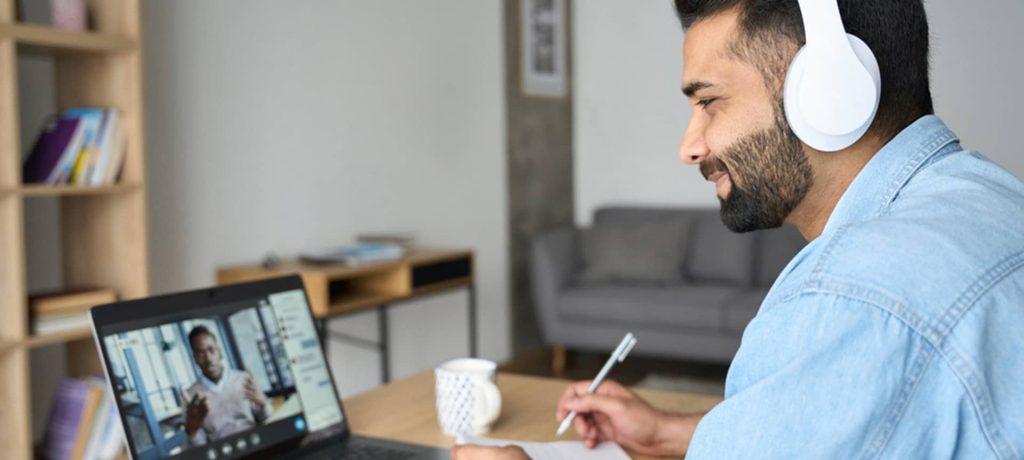 A male candidate provides feedback on the video evaluation interview.