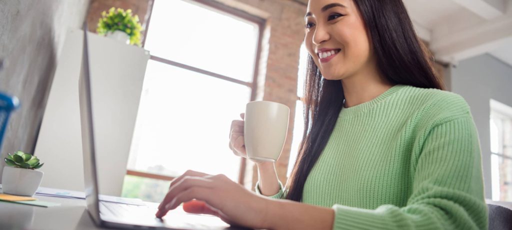 A female HR manager working on laptop