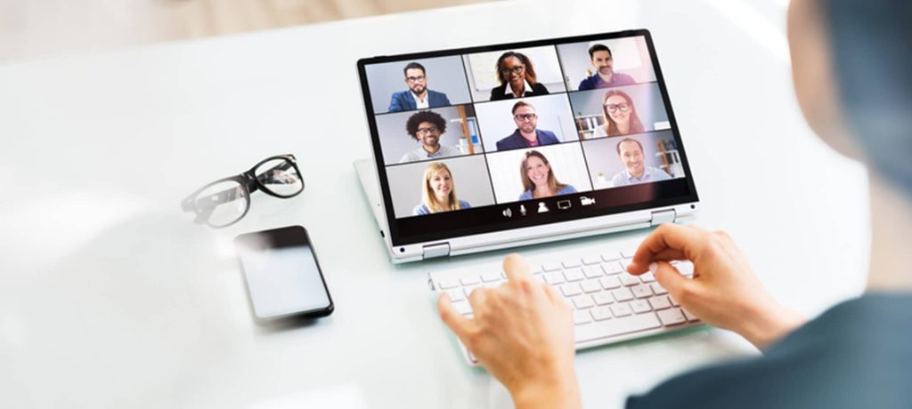 An HR team using video interviewing software to assess top talent 
