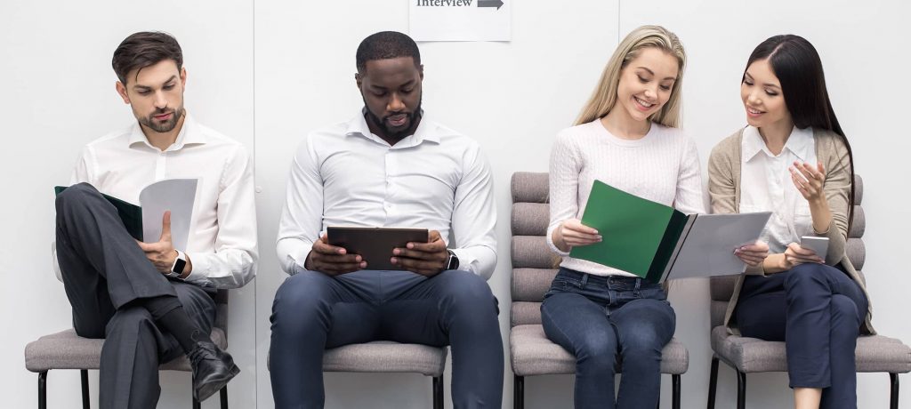 A group of camdidates preparing for an interview 