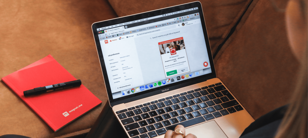 Top 10 Ice Breaker Interview Questions That Build Connection and Reveal True Talent for Successful Hiring | Elevatus girl behind a laptop looking at job preferences