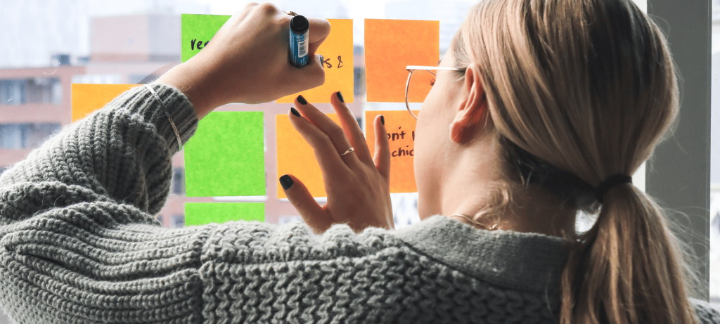 Top 10 Ice Breaker Interview Questions That Build Connection and Reveal True Talent for Successful Hiring | Elevatus girl writes notes on paper