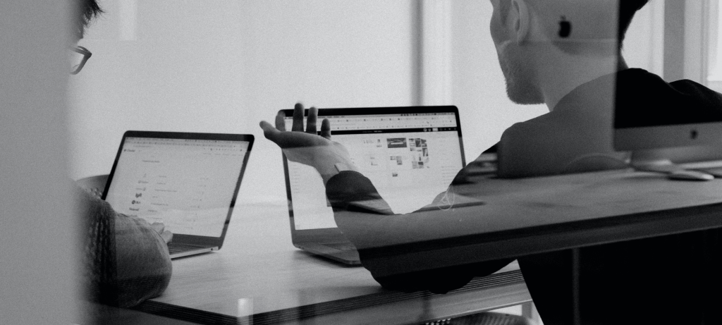 hiring managers discussing workflow