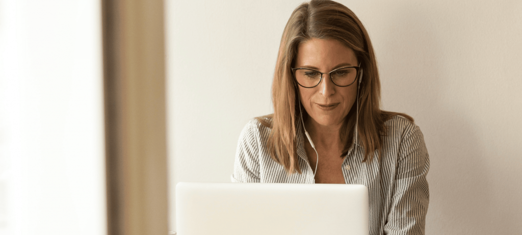 Woman writing on laptop screen the benefits of workforce planning 