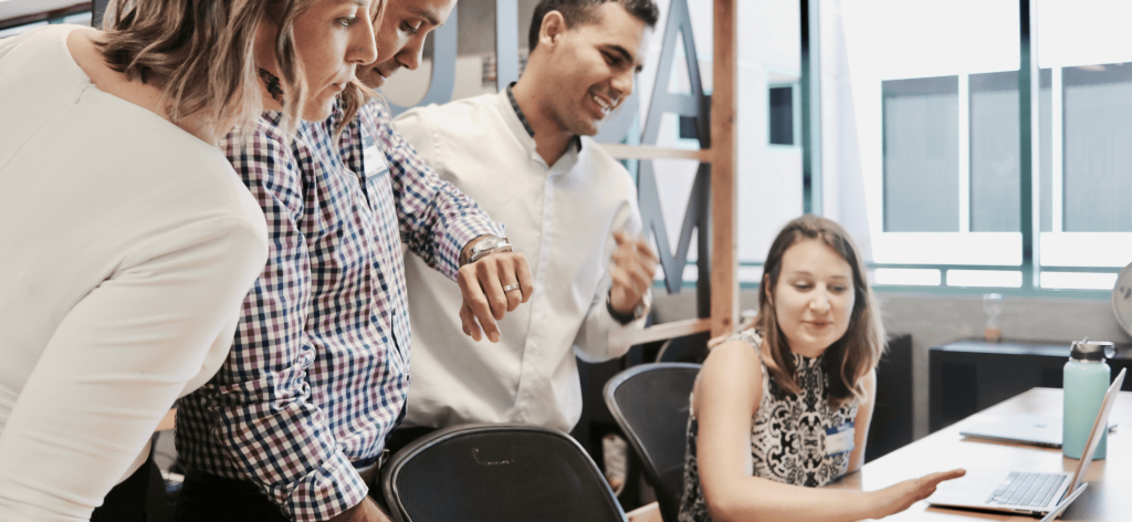 An image of  people in an office setting 