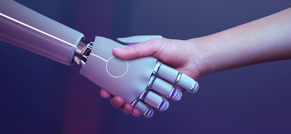 An image of a robot shaking hands with a human 