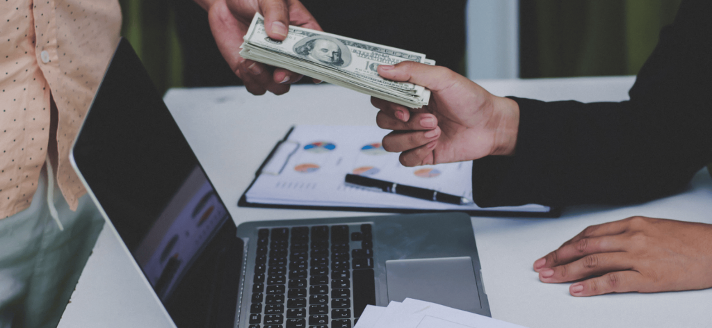 An image of a person setting a budget for online recruitment 