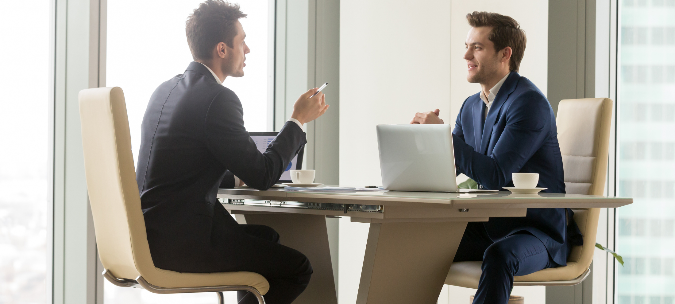 two employees conveying What is an exit interview