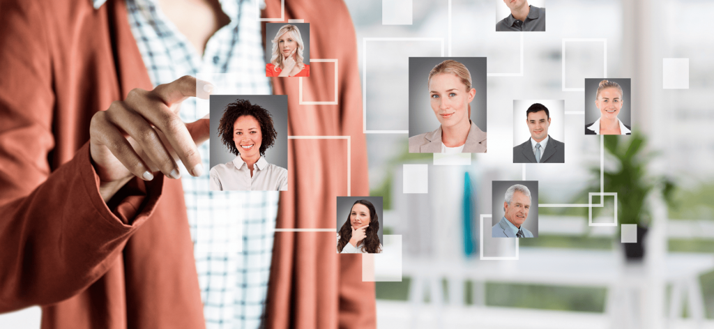 An image of a woman using an applicant tracking system for hiring success