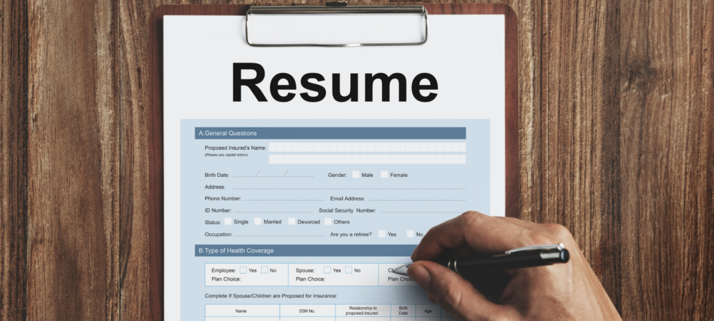 A recruiter creating a resume screening checklist 