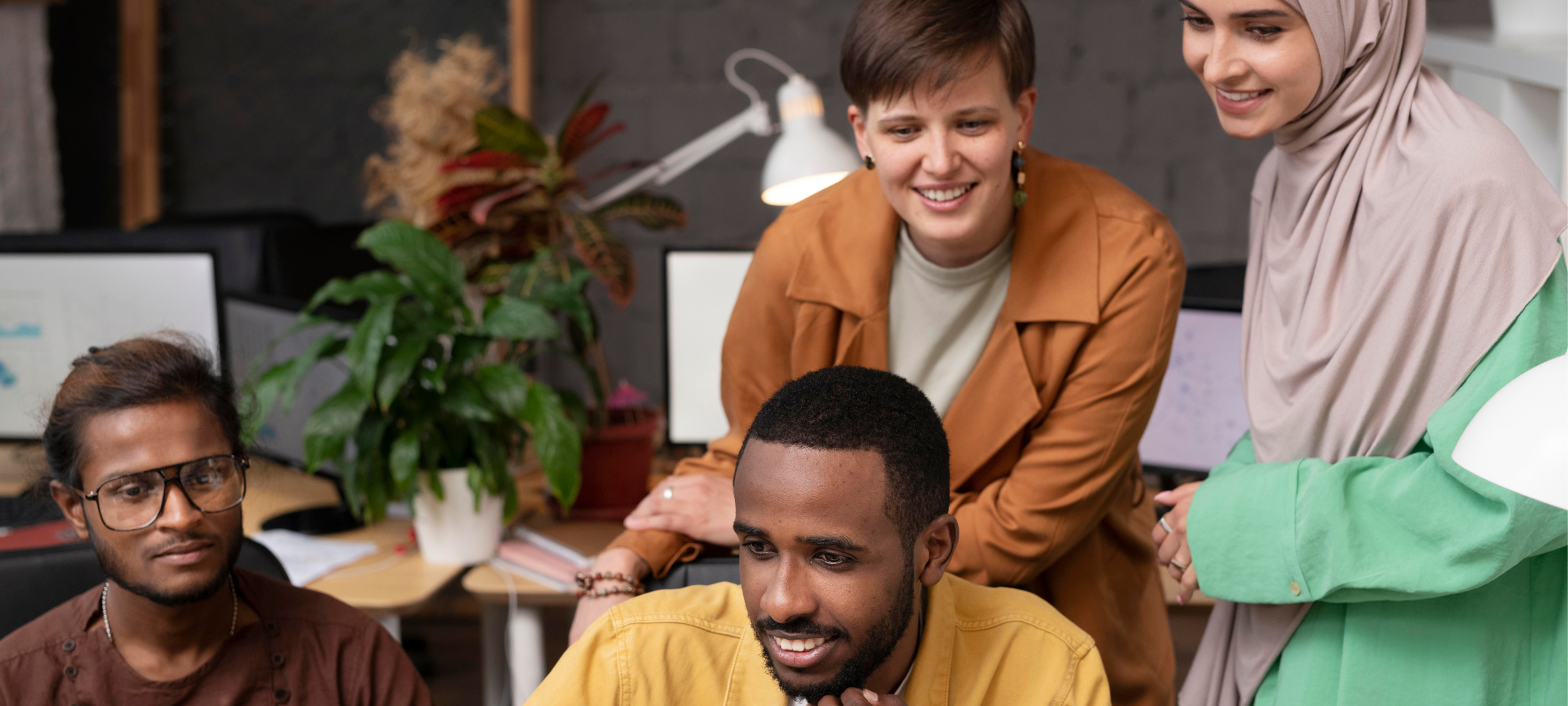 Employees looking up the DEI meaning online