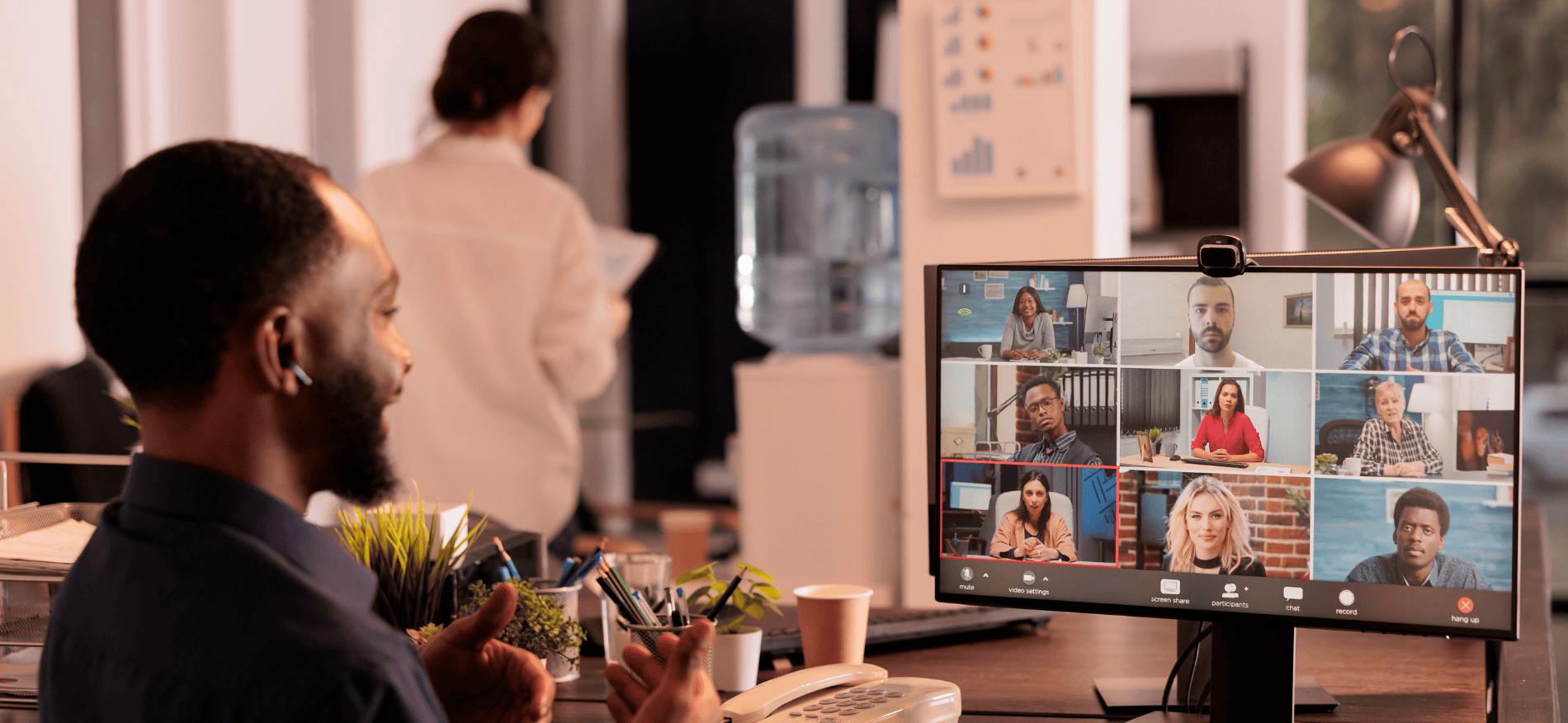 An image of a man onboarding remote employees