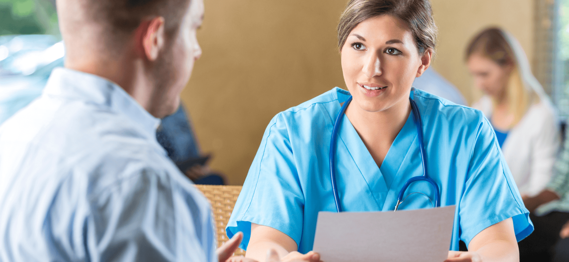 Senior healthcare executive recruitment team in a meeting, discussing strategies