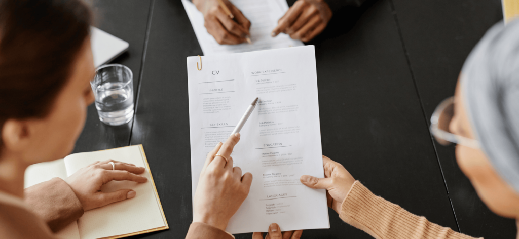 An image of HR professionals optimizing job application tracking processes