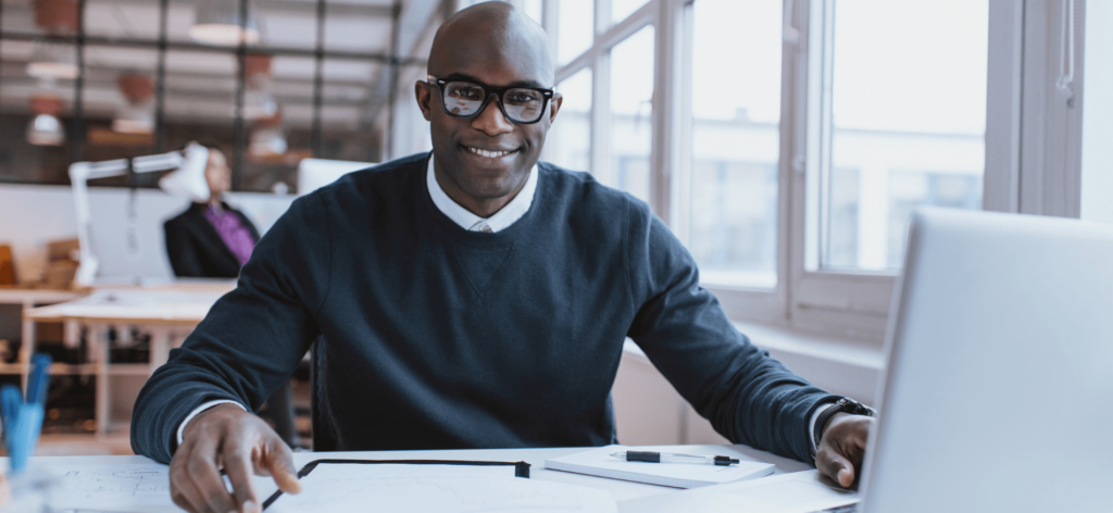 HR manager reviewing data insights from an onboarding survey report