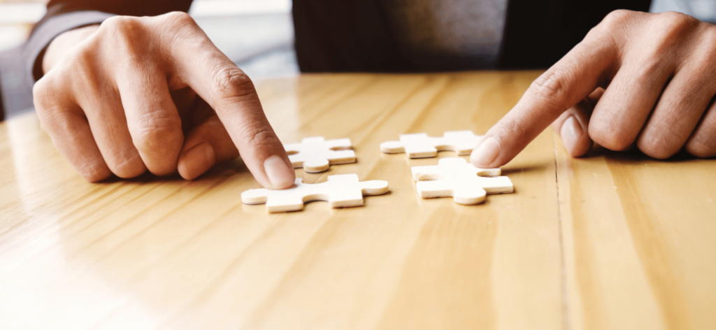 An image of a puzzle balancing “Efficiency” and “Quality,” highlighting the core benefits of AI recruitment.

