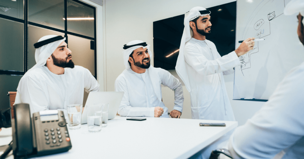 An image of a diverse team collaborating remotely using cloud-based HR software, reflecting digital HR trends.
