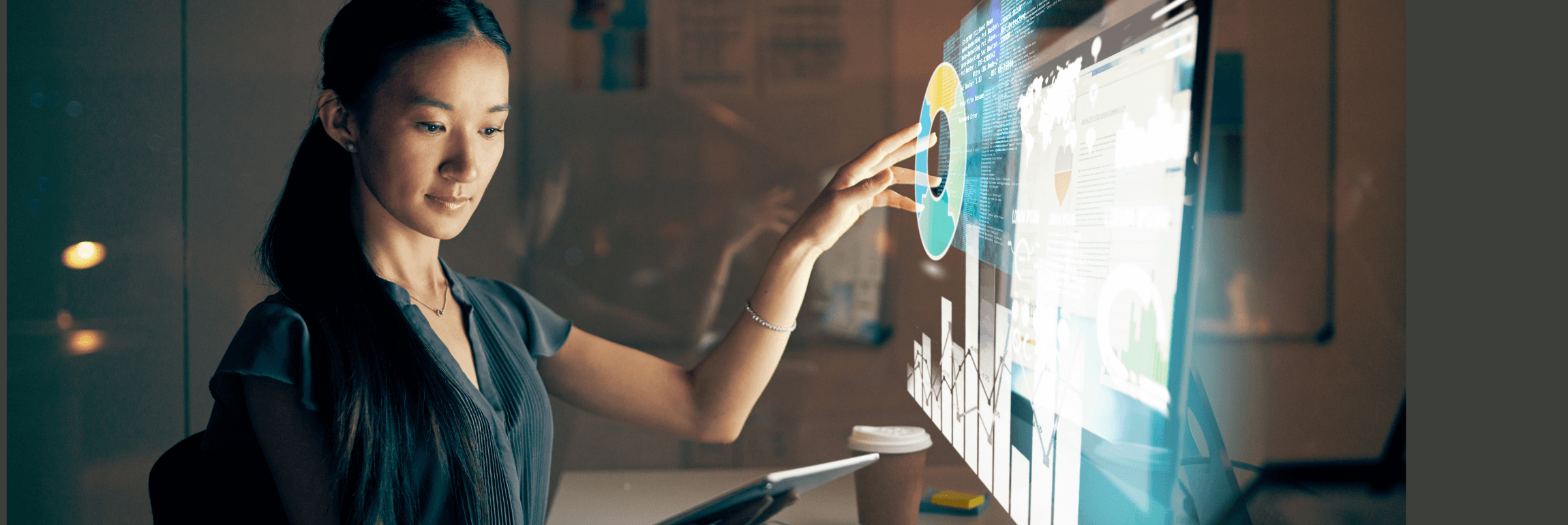 An image of a recruiter conducting pre-employment screening on a computer.