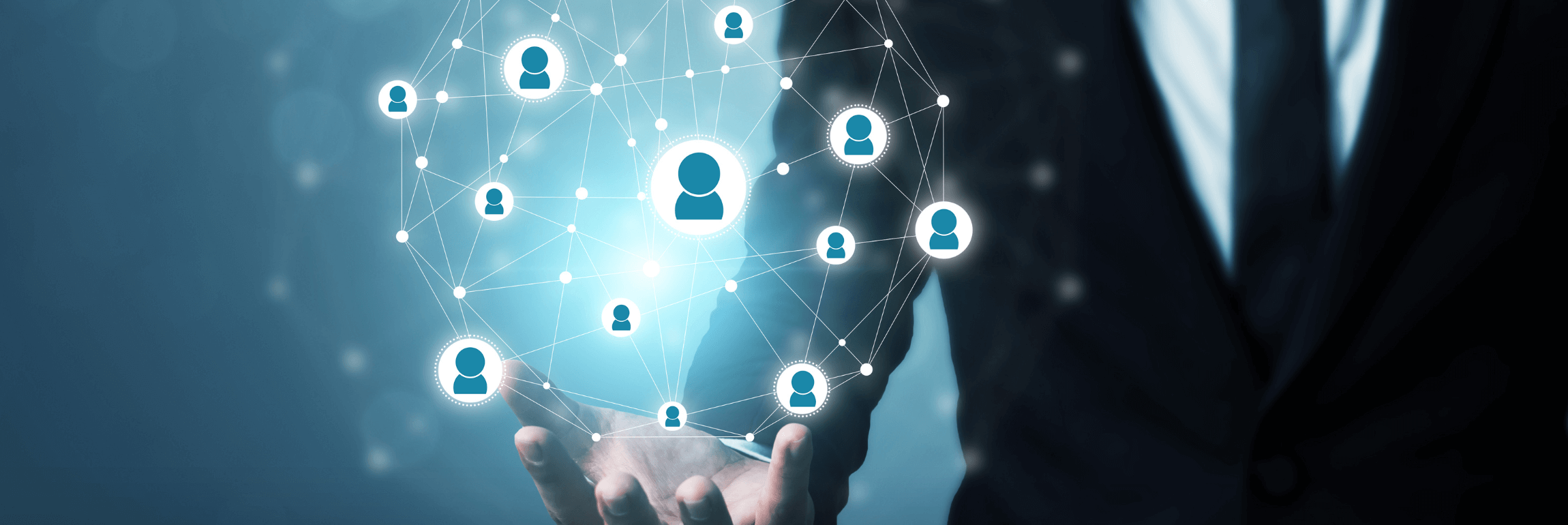 An image of a team reviewing candidate data through a digital recruitment platform.