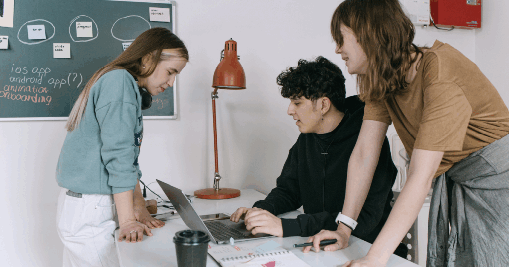 HR professionals reviewing documents in employee onboarding software.