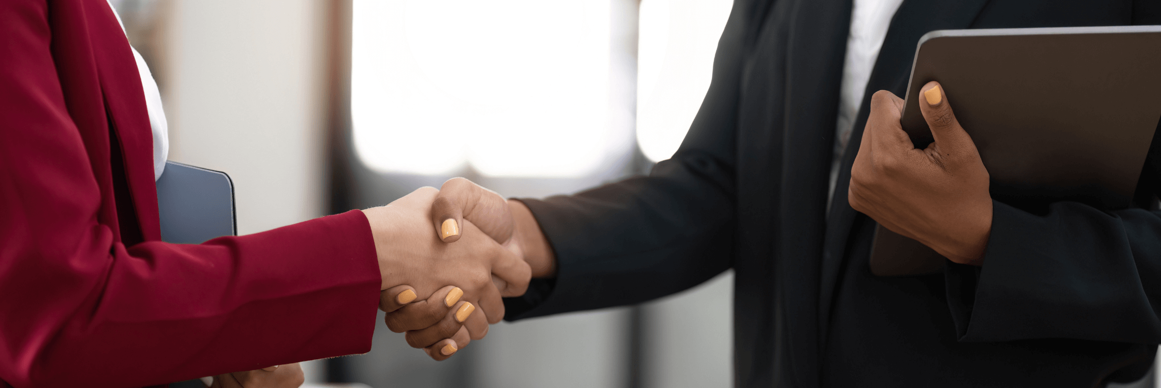 a team collaborating using talent acquisition software during hiring in Oman