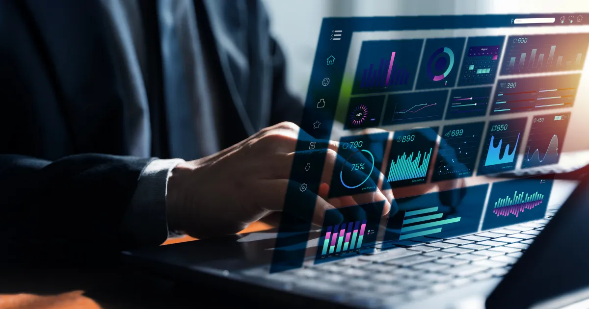 An image of a recruiter reviewing workforce analytics on a dashboard